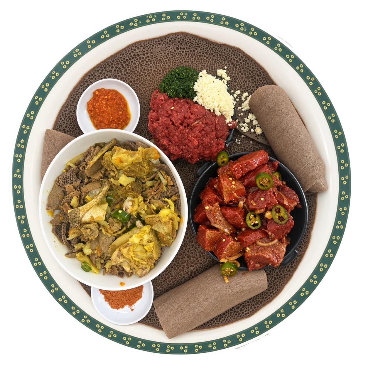 Several meat preparations served with greens, cheese, condiments and injera.